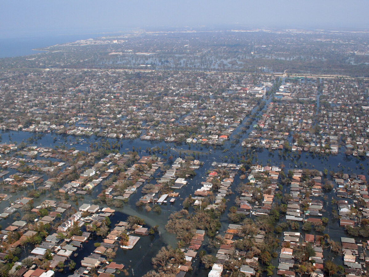 An overhead view of a grid of flooded streets.