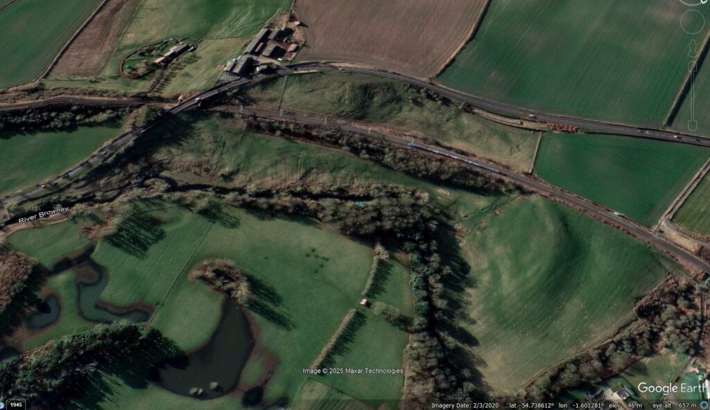 Google Earth image from 2020 showing the Browney Curve landslide site. Note the East Coast mainline railway running across the landslide.
