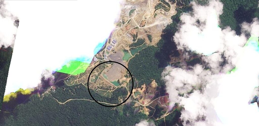 Satellite image of the Bukit Mantri mine site before the mine waste storage facility failure.