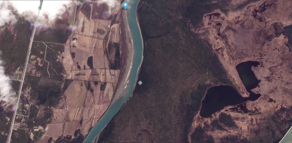 Satellite image of the site of the May 2025 landslide on the Yukon River. Image copyright Planet Labs, collected on 11 May 2025.