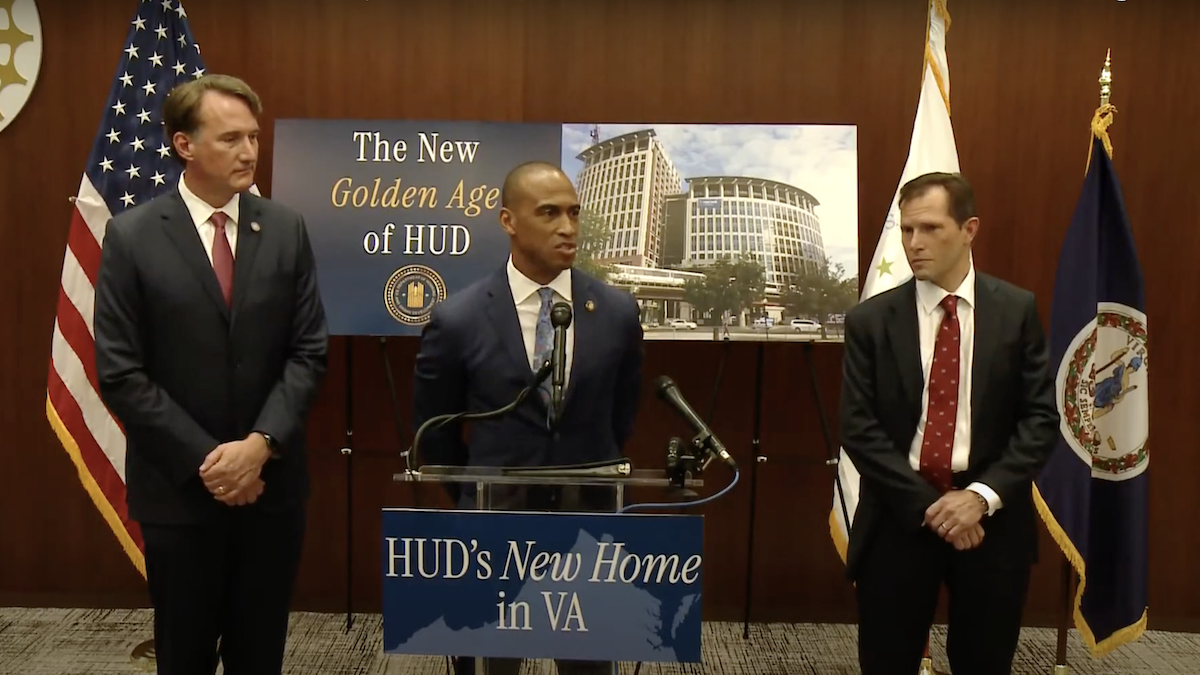 Virginia Governor Glenn Youngkin, U.S. Department of Housing and Urban Development (HUD) Secretary Scott Turner, and U.S. General Services Administration Public Buildings Service Commissioner Michael Peters at a press conference.