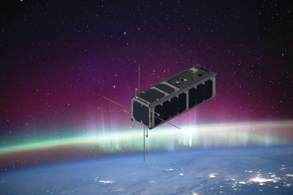 An artist’s rendering of a 3U CubeSat orbiting the nightside of Earth.