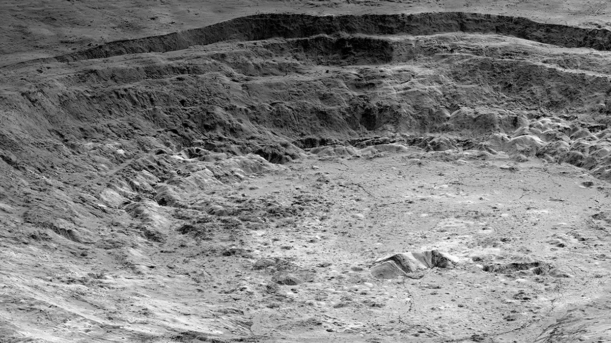 Photo of a large crater on the moon.