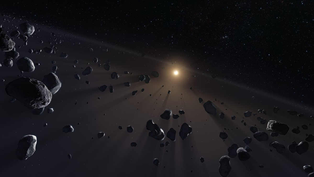 Gray rocks appear against a dark sky, with a bright star in the background.