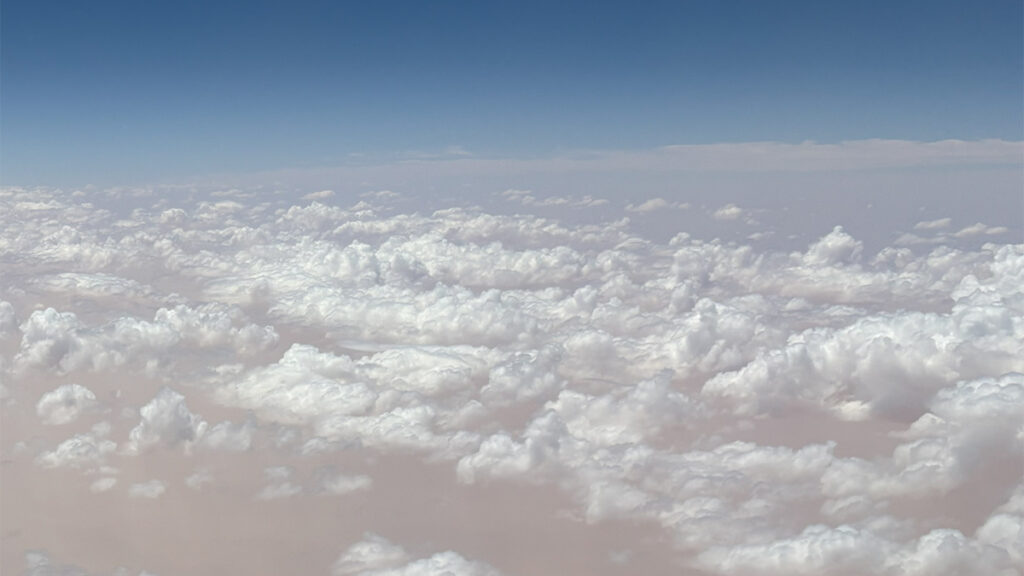 A layer of clouds seen from overhead from an airplane