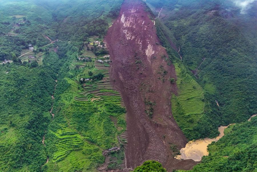 A drone photo taken on May 22, 2025 shows the site where a landslide took place in Qingyang Village, Guowa Township of Dafang County, southwest China's Guizhou Province.