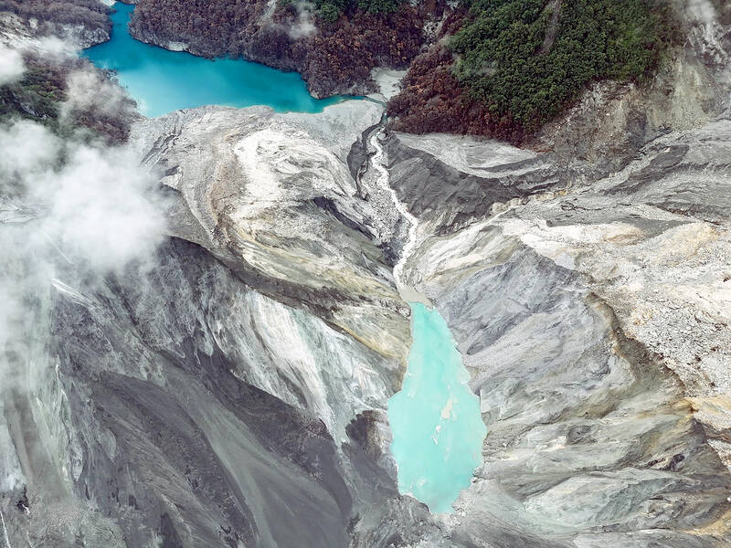 The Matai'an landslide barrier lakes prior to the failure of the lower one on 21 October 2025.
