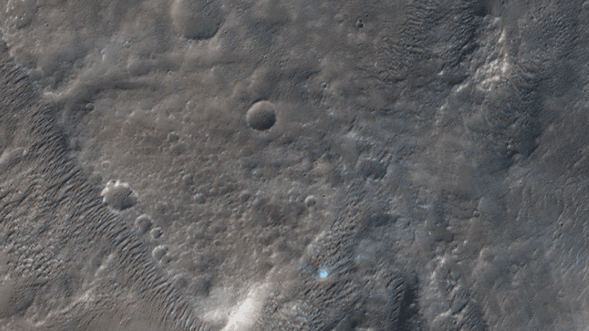A gif shows a dust devil on the surface of Mars moving between two locations.