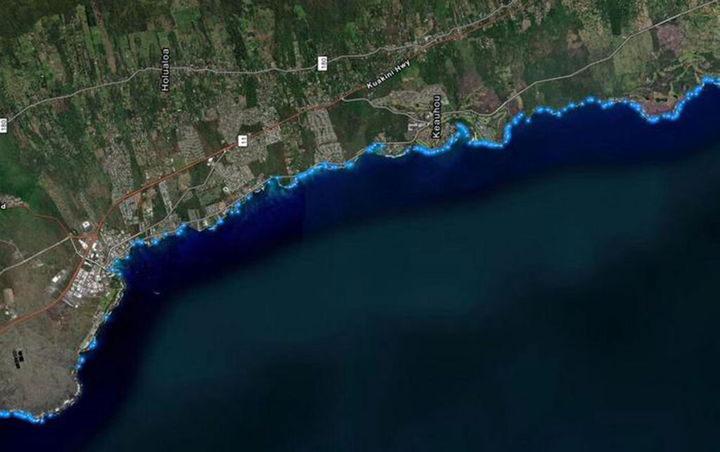 Points of sewage-contaminated discharge sites are colored blue in this aerial photo of the Kona coast of Hawai’i.