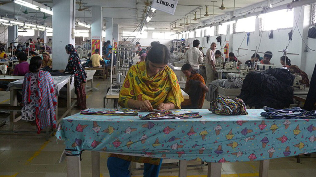 People sew clothing in a Bangladeshi garment factory.