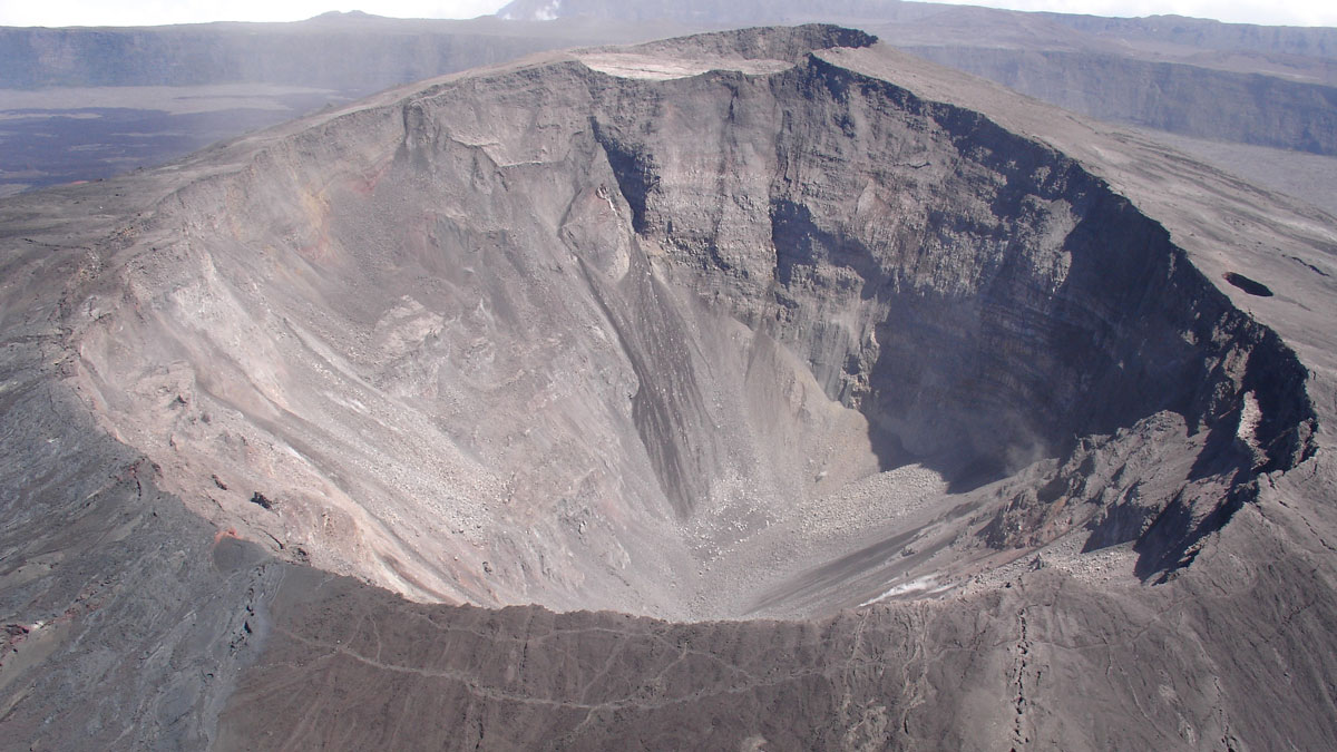 Lessons and Lingering Questions from Collapsing Basaltic Calderas
