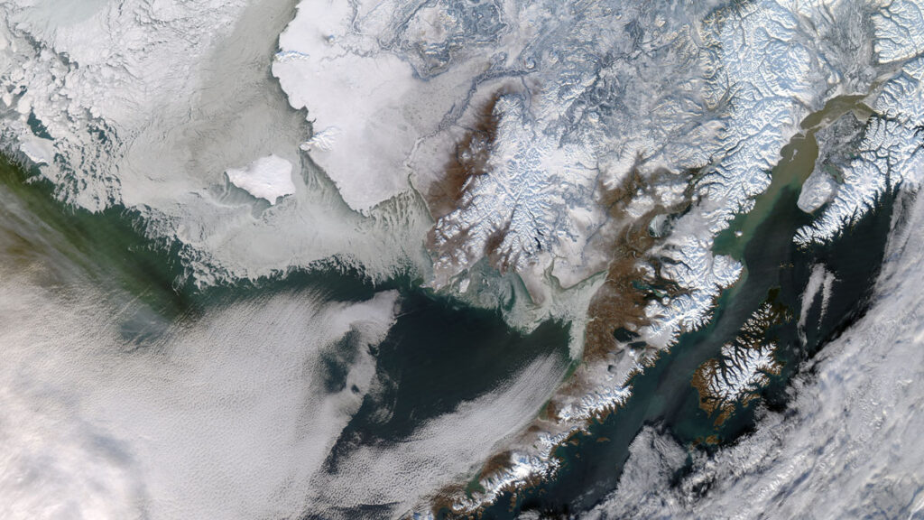Aerial view of snow-covered Yukon River Delta in Alaska.
