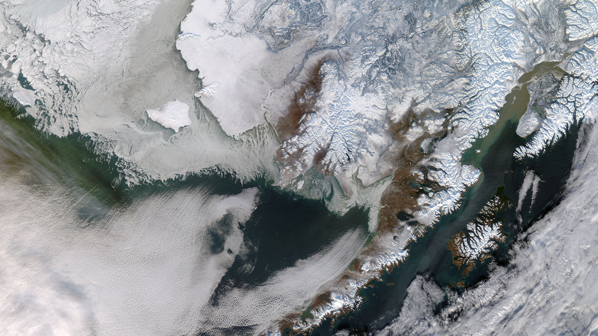 Aerial view of snow-covered Yukon River Delta in Alaska.