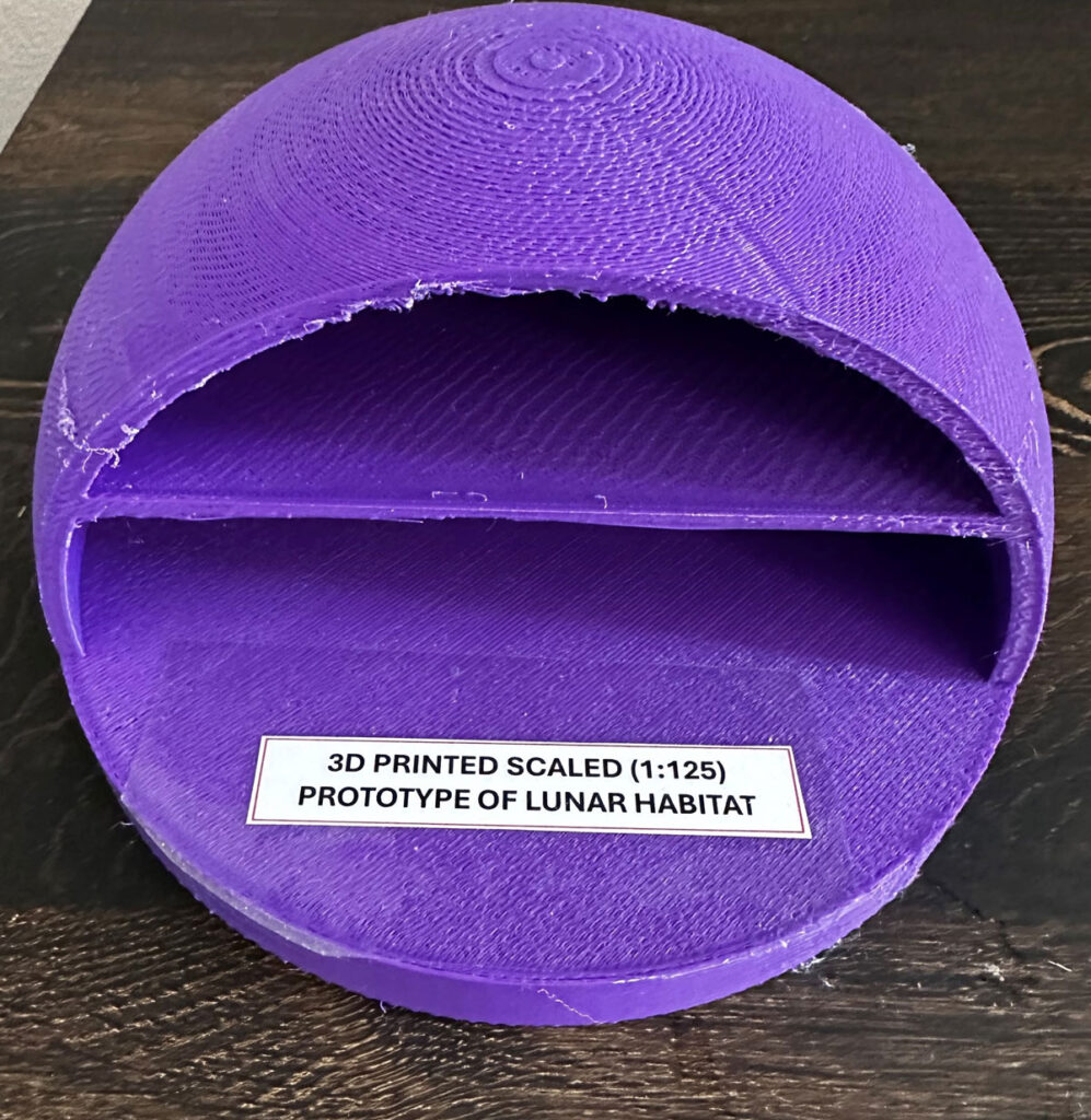 A purple 3D printed model of a lunar habitat dome.