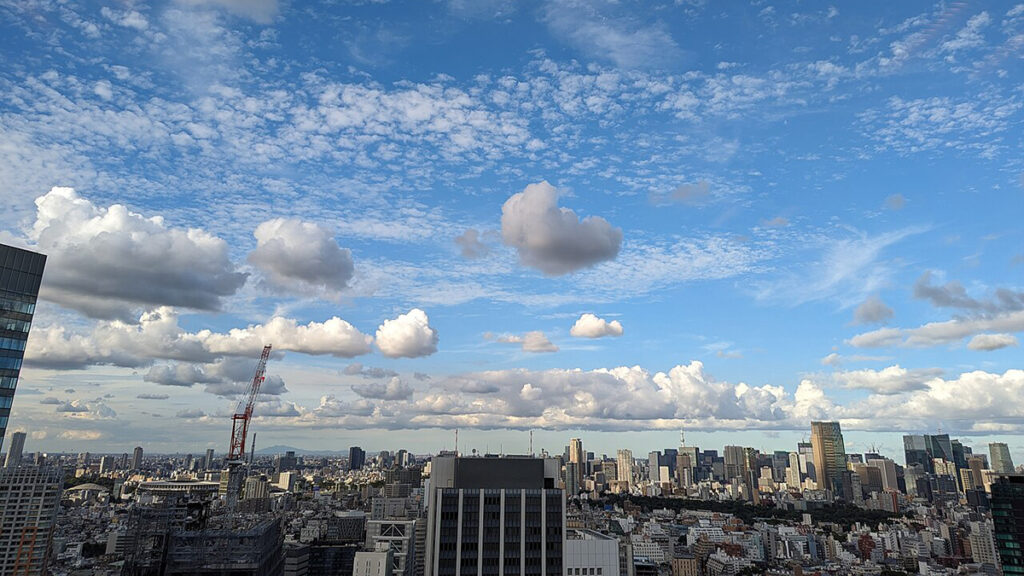 Clouds hang low over the skyline of the city of Tokyo.