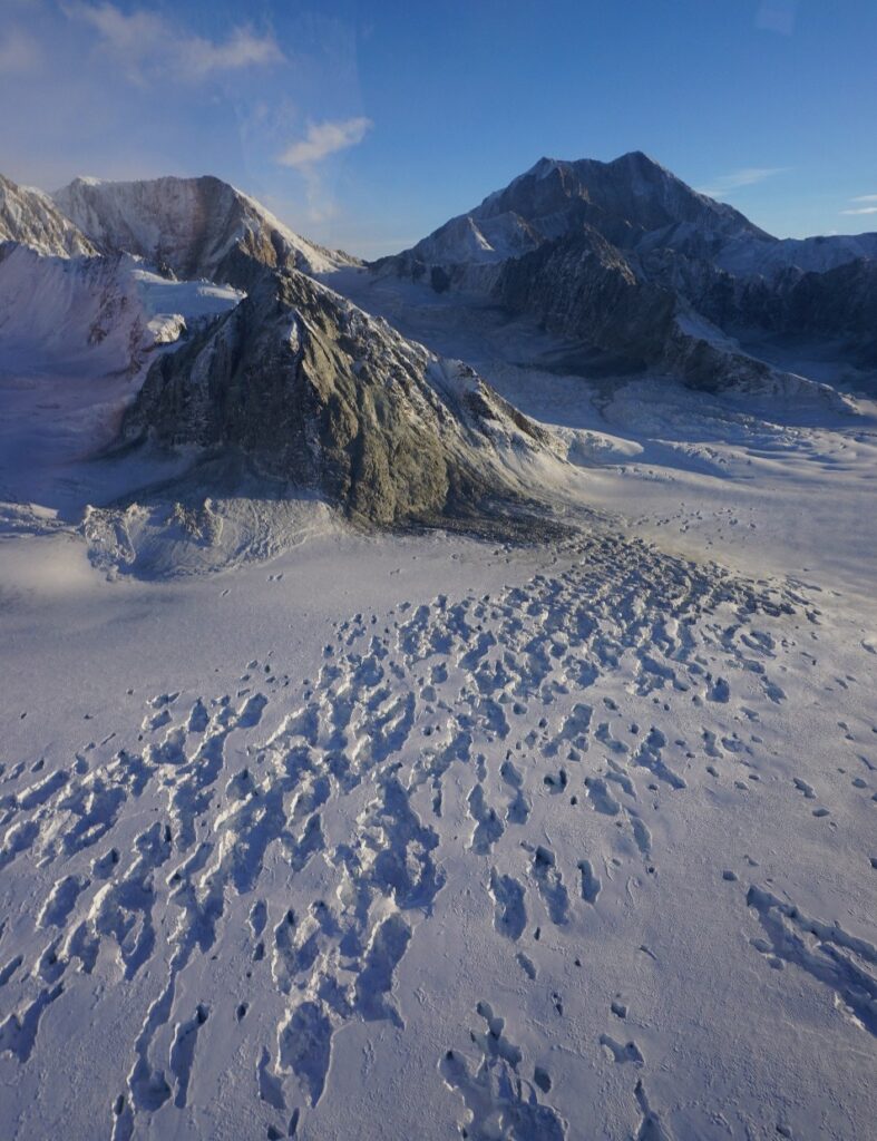 Widespread collapse of seracs and snow bridges on the south side of Mt Queen Mary. The field of view mid-photo is approximately 5 km across.