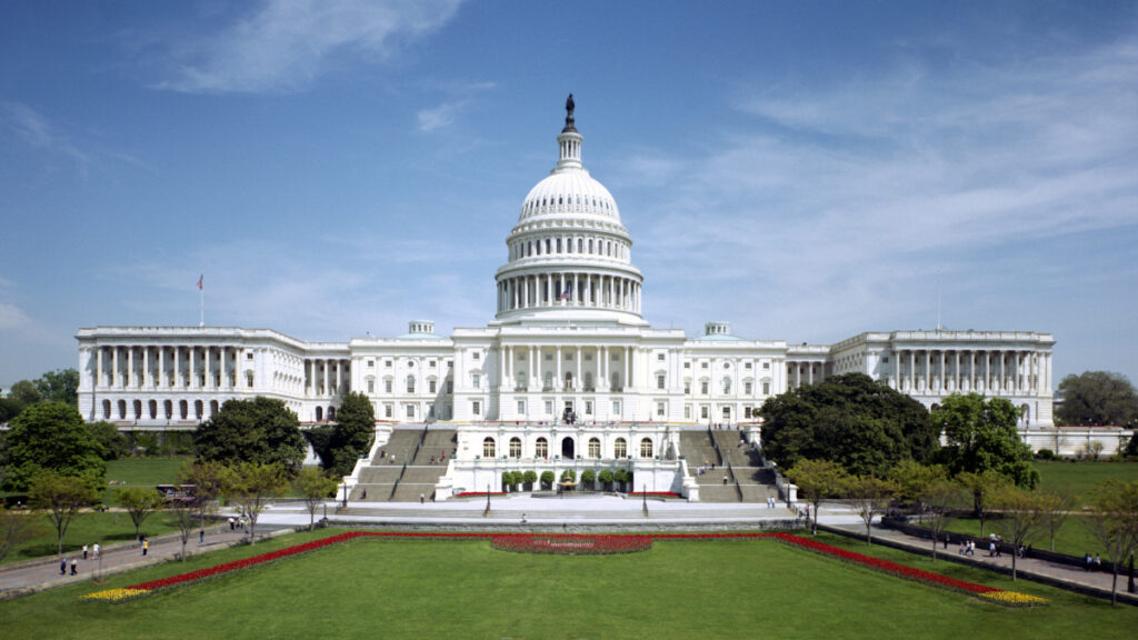Photo of the U.S. Capitol Building on a partly cloudy day