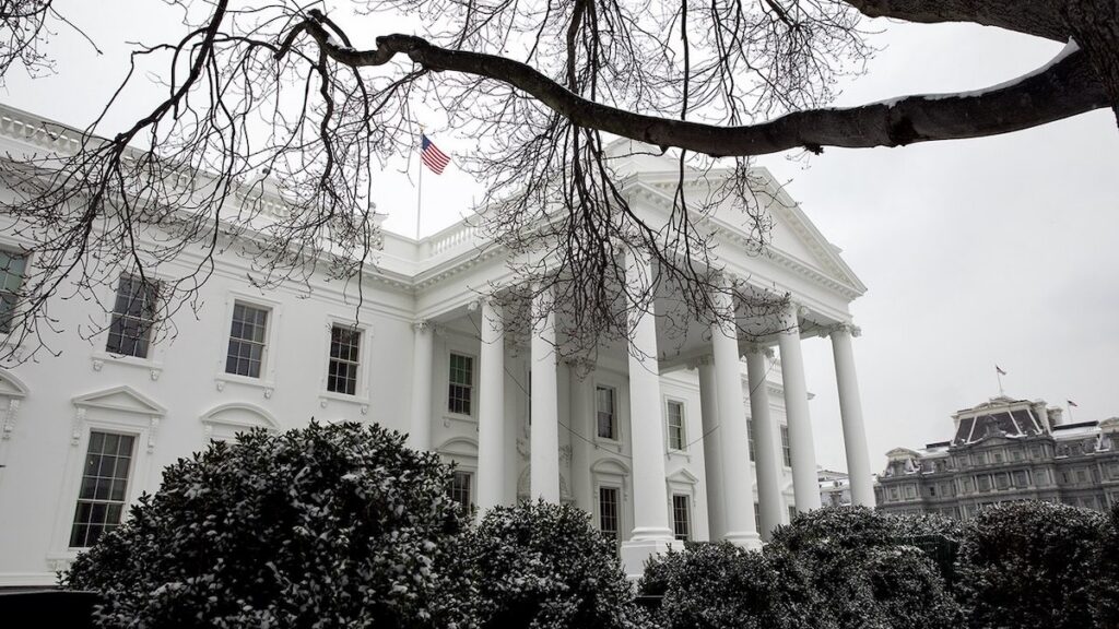 The United States White House on a cloudy, snowy day.