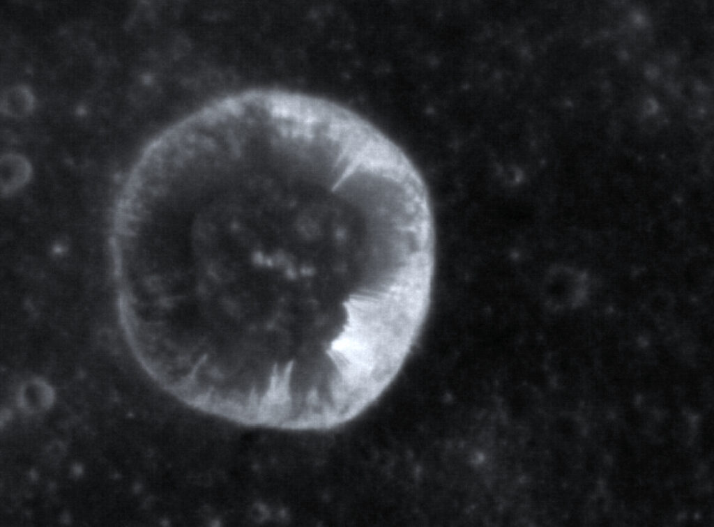 Side-by-side images of craters on Mercury that have streaks coming down from the crater rims.