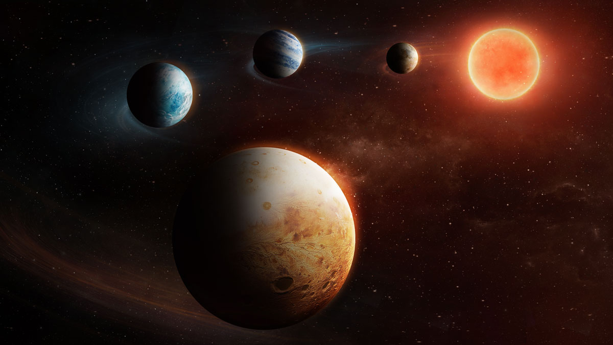 Four planets are shown orbiting a star.