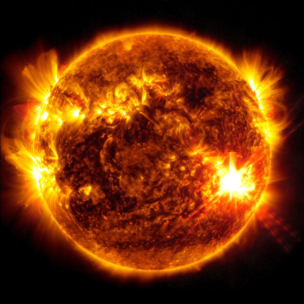 Solar flares burst off of the Sun.