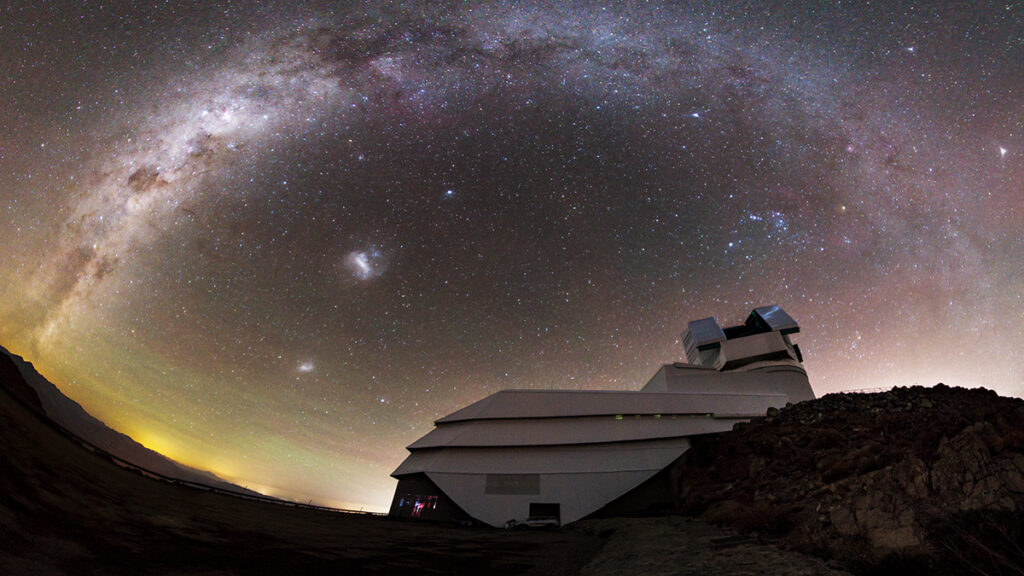The Vera C. Rubin Observatory appears beneath the Milky Way and the Large and Small Magellanic Clouds.