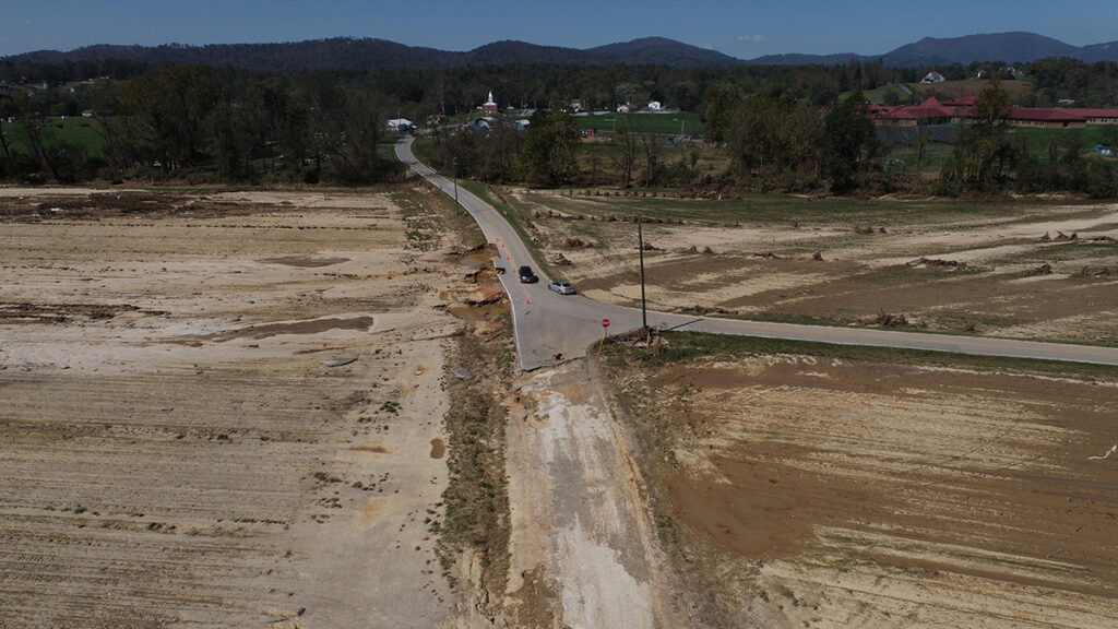 Aerial view of muddy flood debris across fields in North Carolina