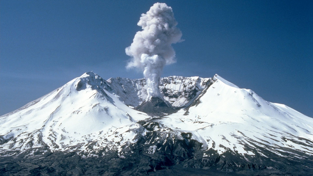 Photo of a volcano erupting.