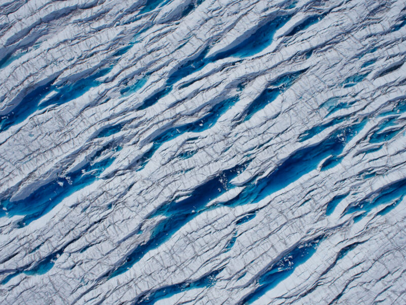 Stretching and Squeezing Release Glacial Meltwater