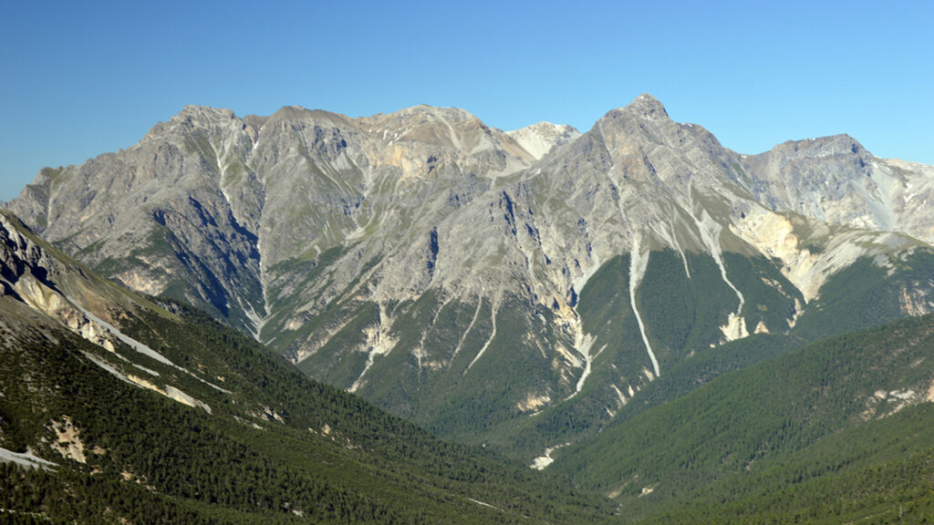 A clear tree line is visible on a mountain range.