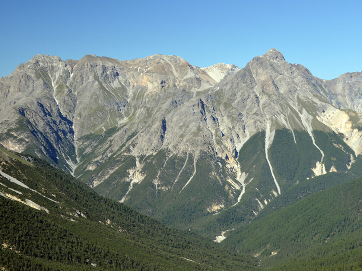 A clear tree line is visible on a mountain range.