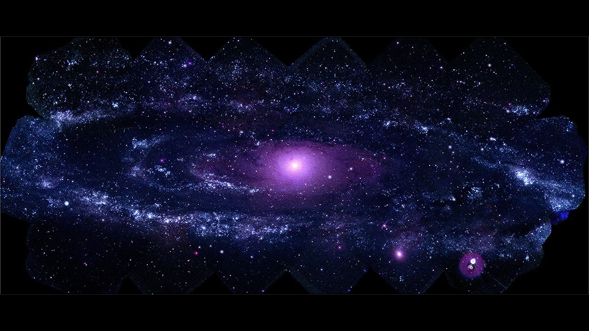 A purple spiral galaxy is visible in the night sky.