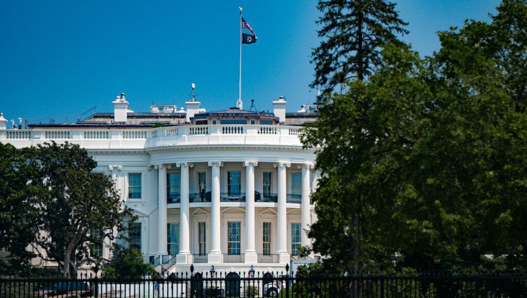 The United States White House pictured on a sunny day.