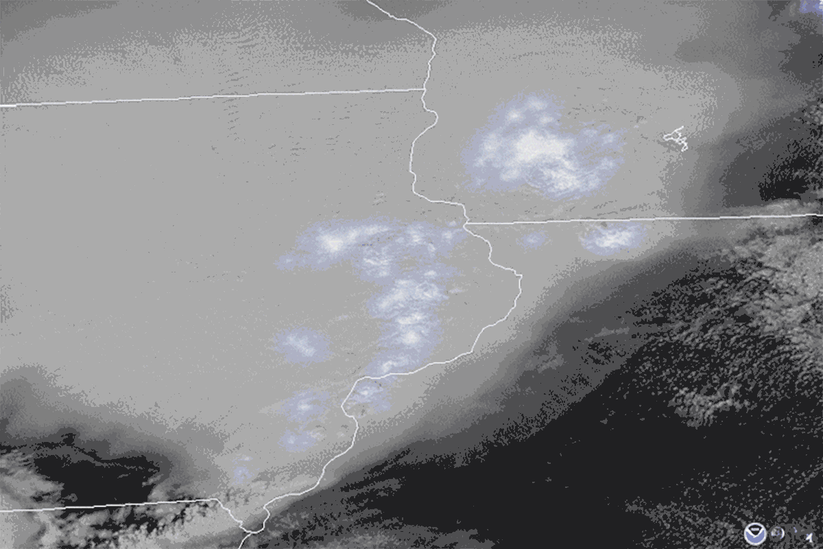Satellite imagery showing a storm moving across Iowa, Wisconsin, and Illinois