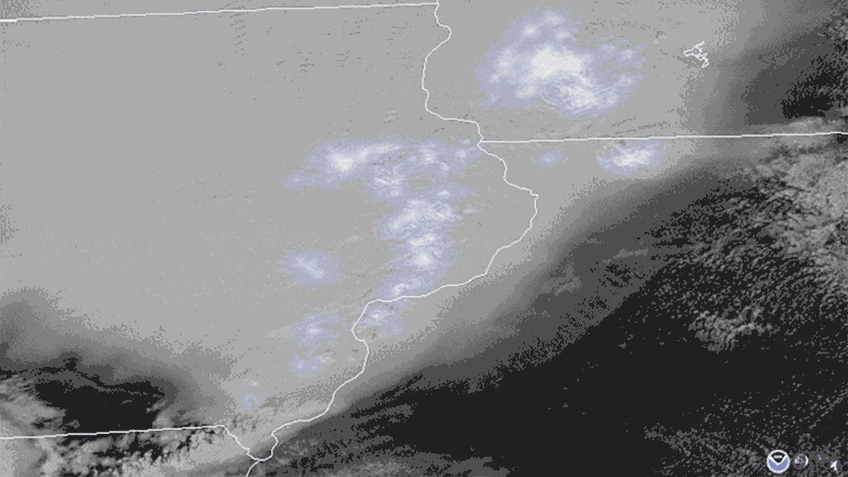 Satellite imagery showing a storm moving across Iowa, Wisconsin, and Illinois