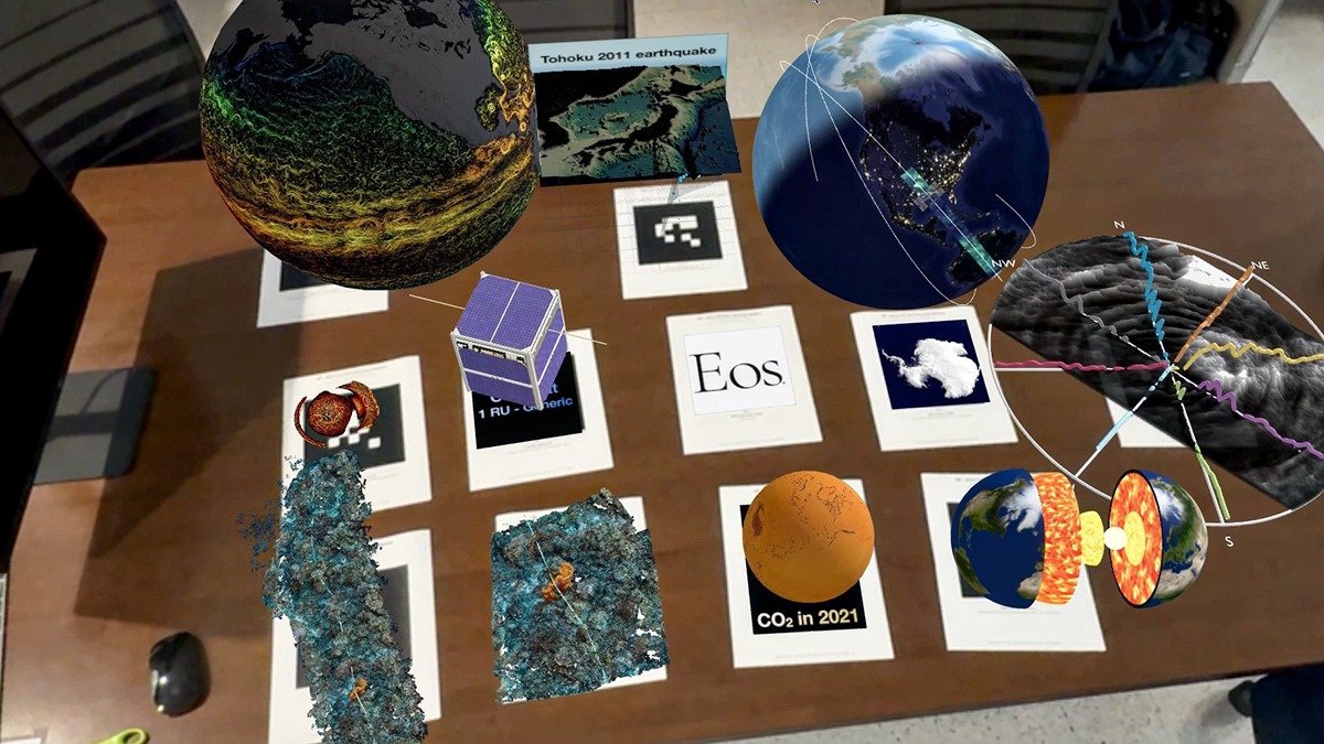 Three-dimensional models of several augmented reality objects—including a projection of earthquake data, a cubesat, ocean currents projected on a globe, a cutaway view of Earth’s interior, atmospheric carbon dioxide movement projected on a globe, and Antarctic topography—are seen here.