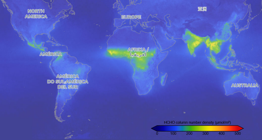 Two-dimensional global map projection showing satellite data of atmospheric formaldehyde concentrations represented by a range of colors from blue (low concentrations) to yellow to red (high concentrations). Names of the continents are included on the map in different languages.