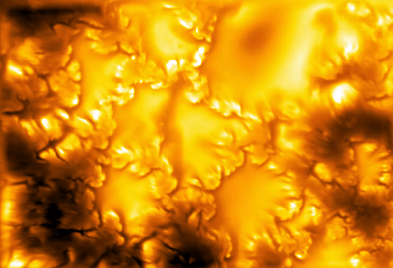 A gif of several cells on the Sun’s surface convecting. The movie is in shades of gold.