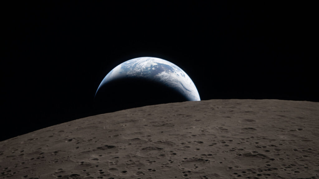 The far side of the moon with Earth setting on its horizon.